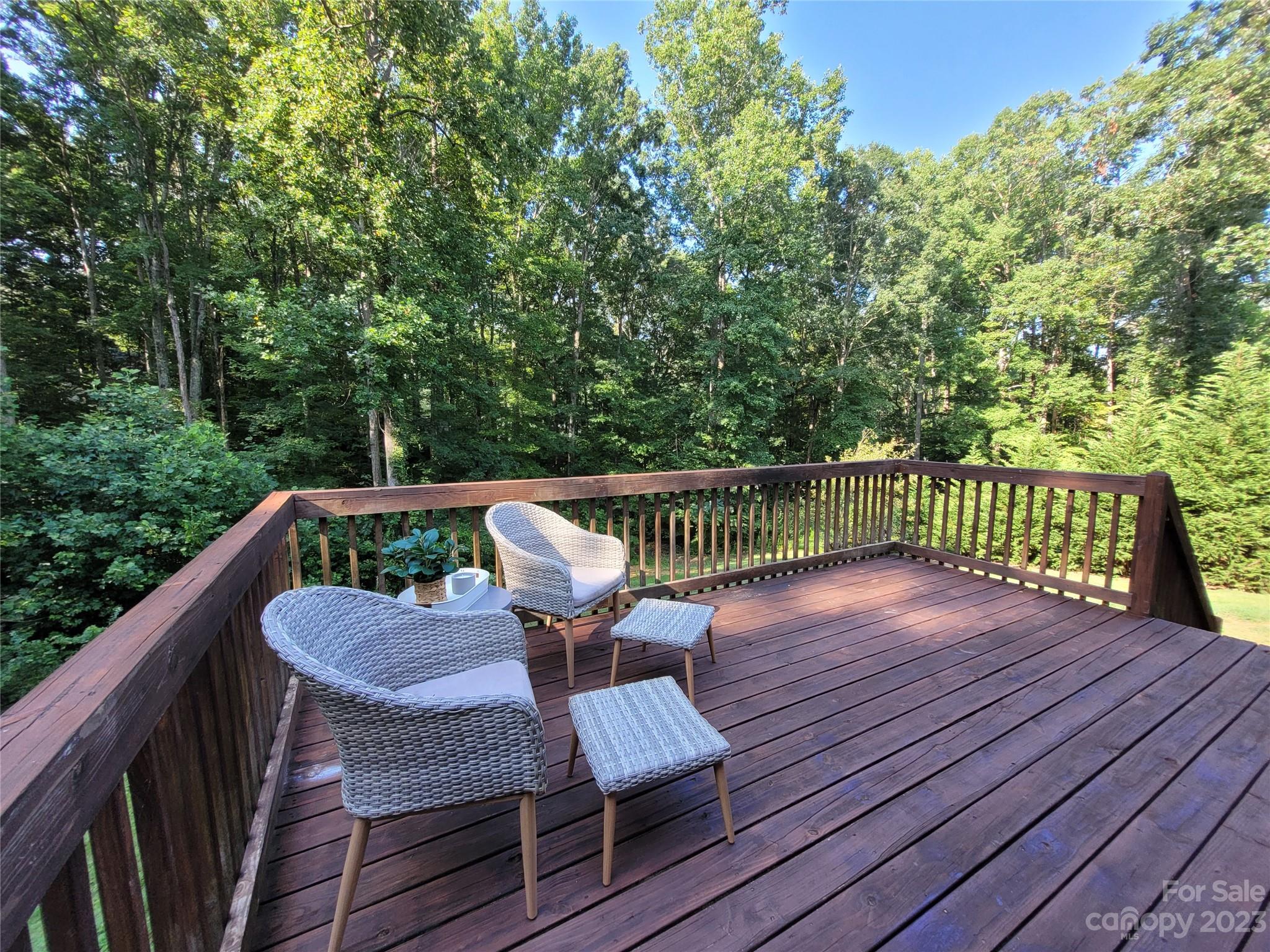 2775 Beechwood Road Denver, NC 28037 - Photo 6 of 26 a view of a wooden deck with furniture