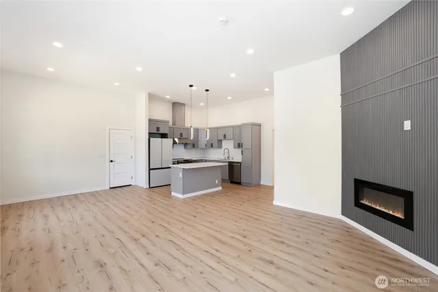 a view of kitchen with wooden floor