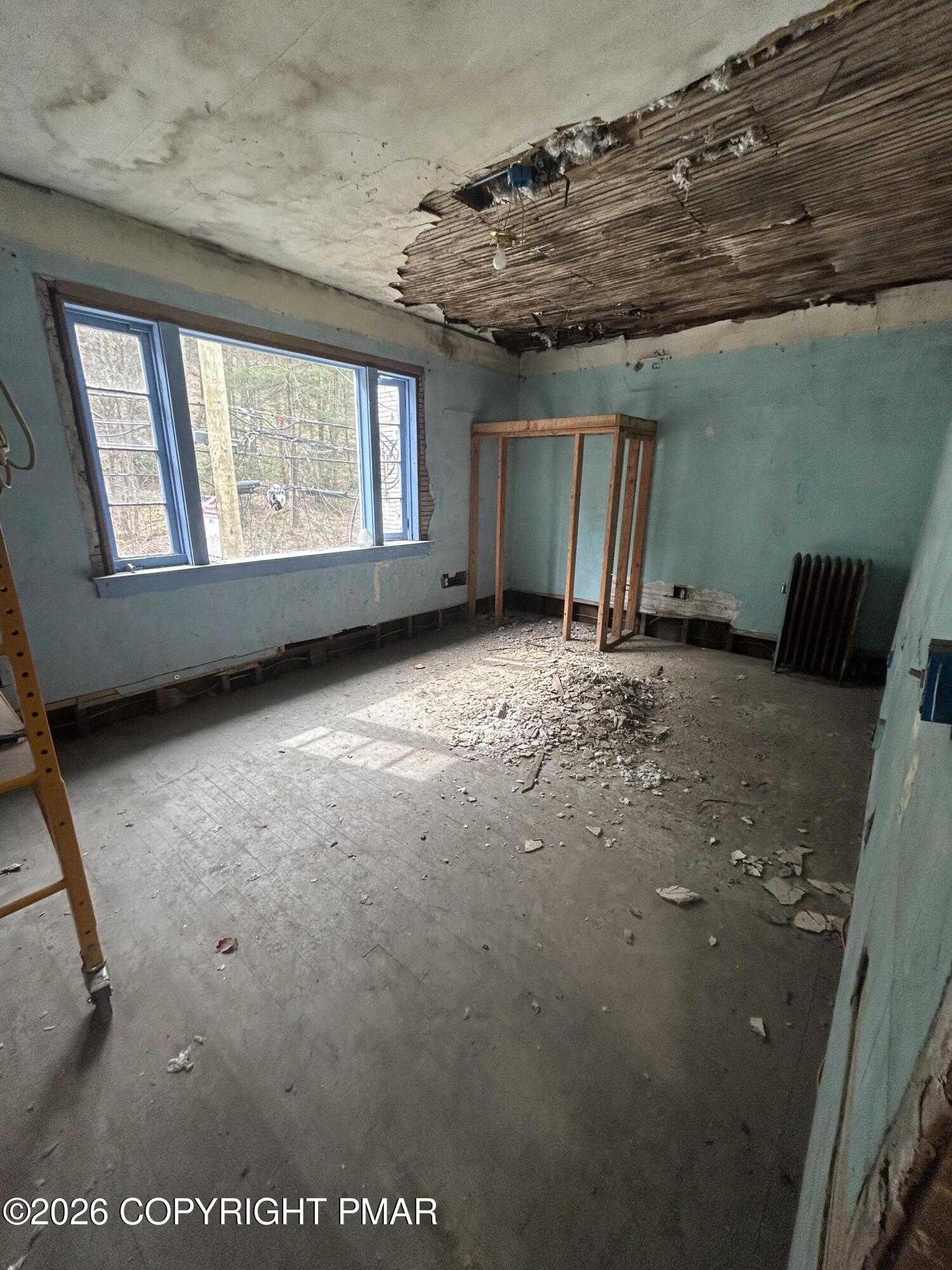 216 East Main Street Glen Lyon, PA 18617 - Photo 16 of 21 an empty room with windows