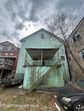 a house view with a garden space