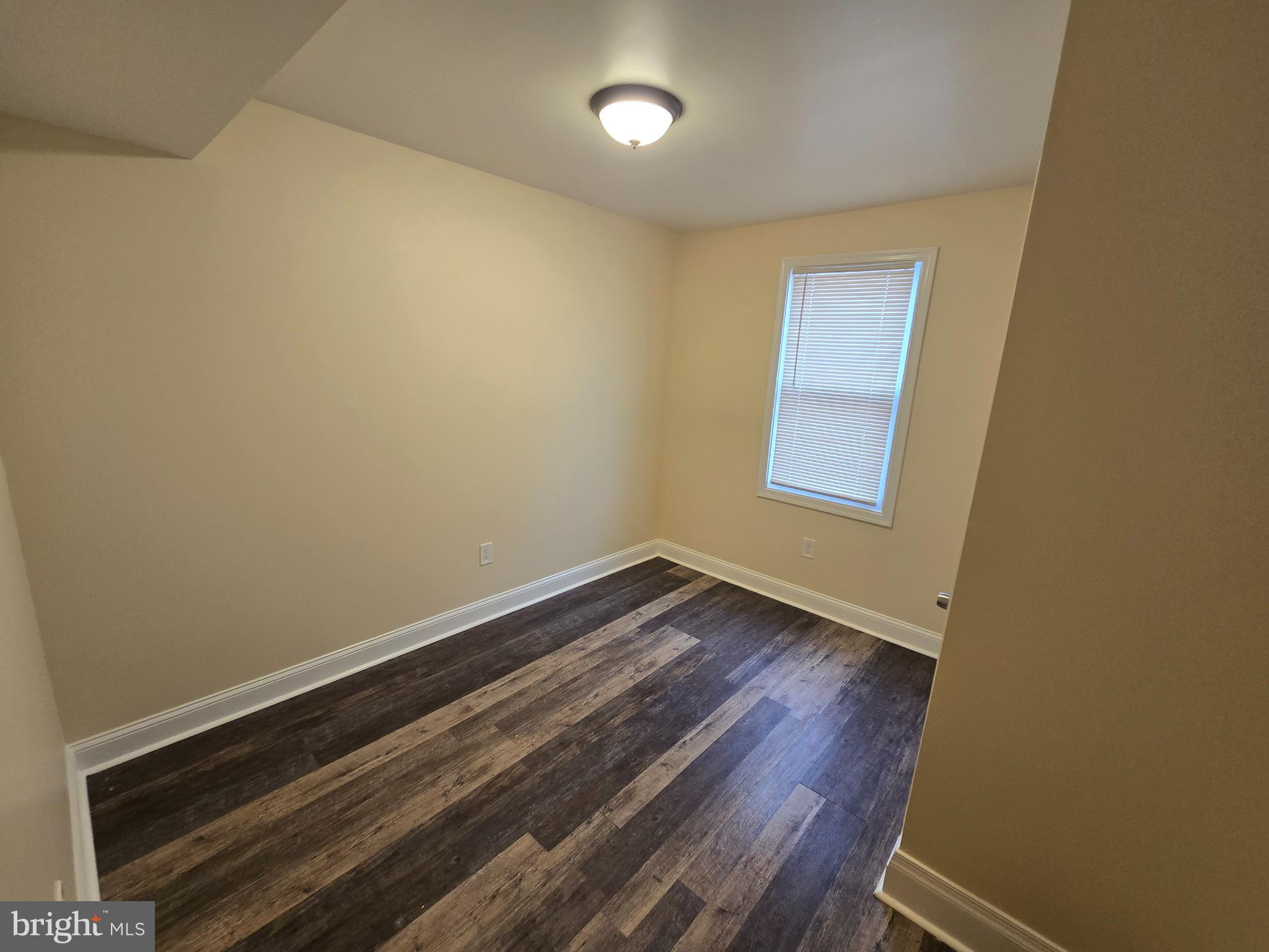 915 MacDade Boulevard Collingdale, PA 19023 - Photo 12 of 15 a view of room with wooden floor and fan