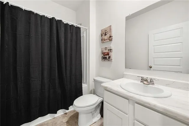 a bathroom with a sink and a toilet