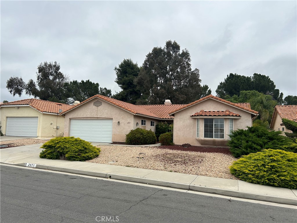 2971 Peach Tree Street Hemet, CA 92545 - Photo 11 of 12 front view of a house with a yard