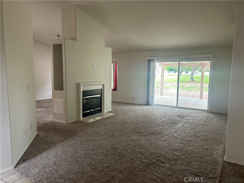 2971 Peach Tree Street Hemet, CA 92545 - Photo 2 of 12 a view of empty room with a fireplace