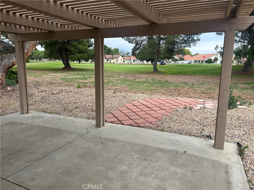2971 Peach Tree Street Hemet, CA 92545 - Photo 7 of 12 a view of a porch with a yard