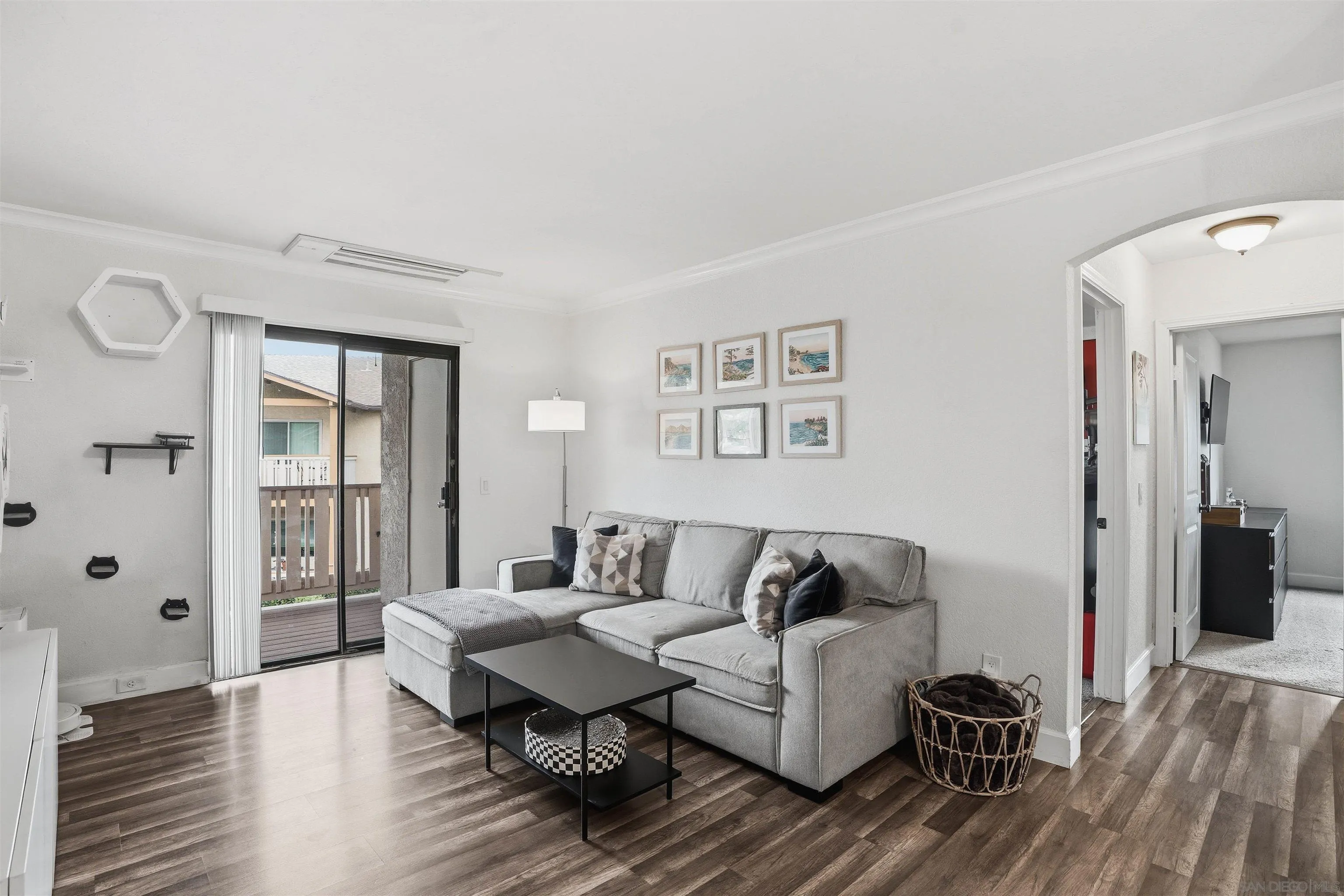 1423 Graves Avenue, Unit 240 El Cajon, CA 92021 - Photo 4 of 25 a living room with furniture and a wooden floor
