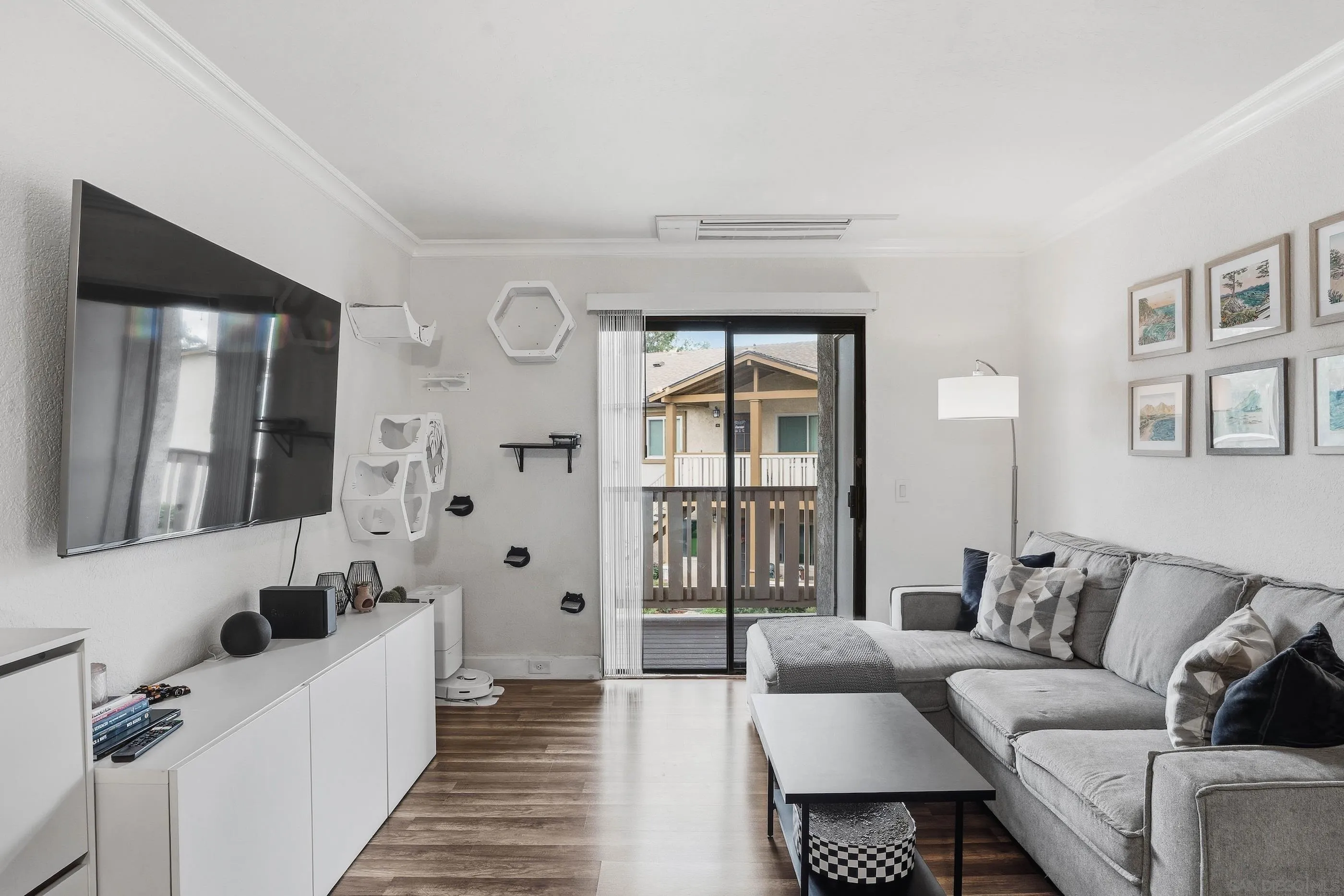 1423 Graves Avenue, Unit 240 El Cajon, CA 92021 - Photo 5 of 25 a living room with furniture and a lamp