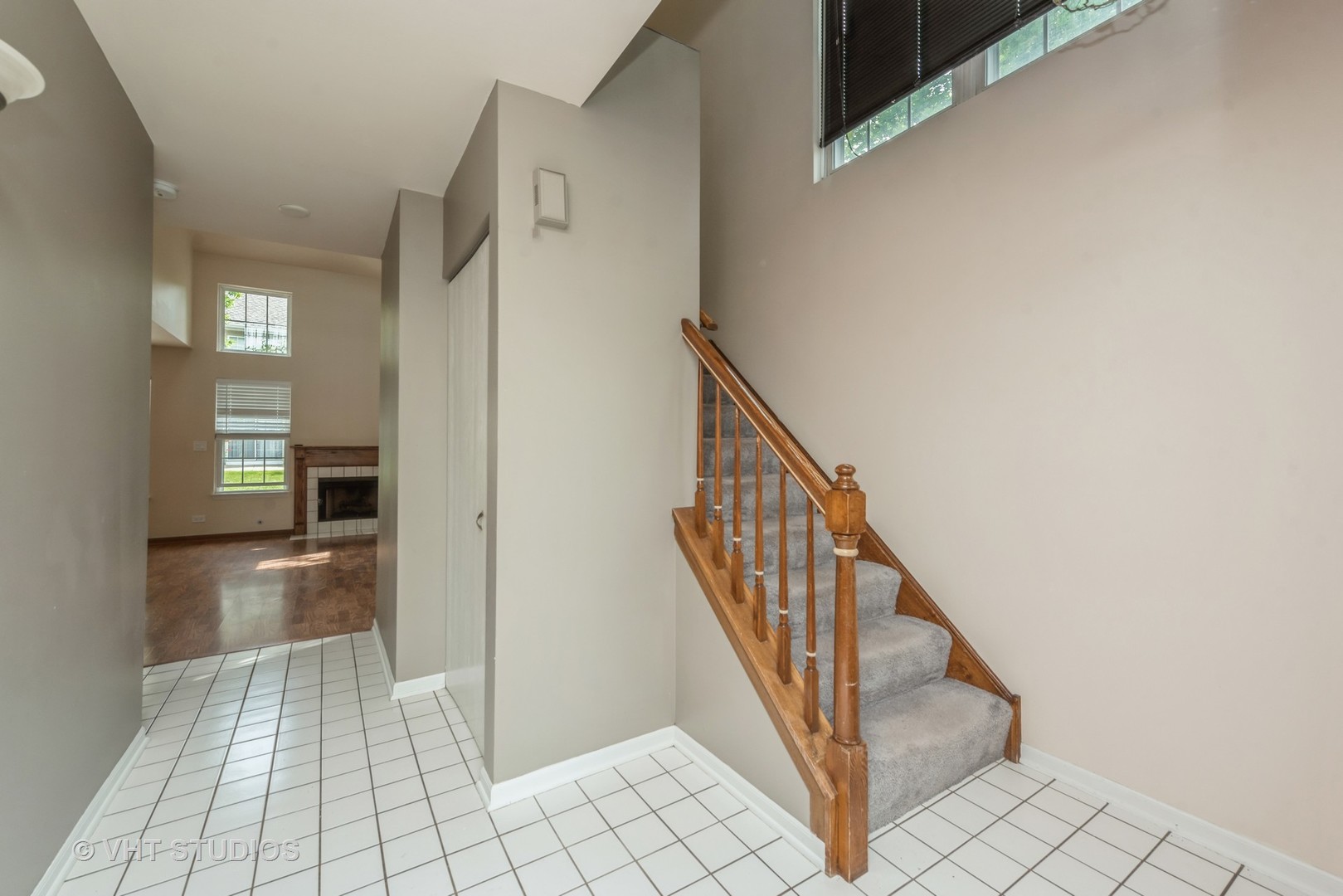 125 Parkview Drive Wauconda, IL 60084 - Photo 2 of 14 a view of a hallway with wooden floor and staircase