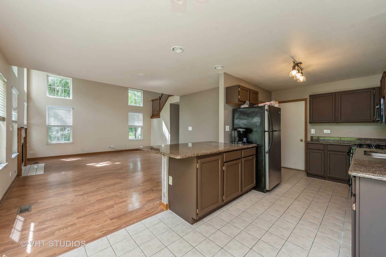 125 Parkview Drive Wauconda, IL 60084 - Photo 6 of 14 a large kitchen with cabinets and stainless steel appliances