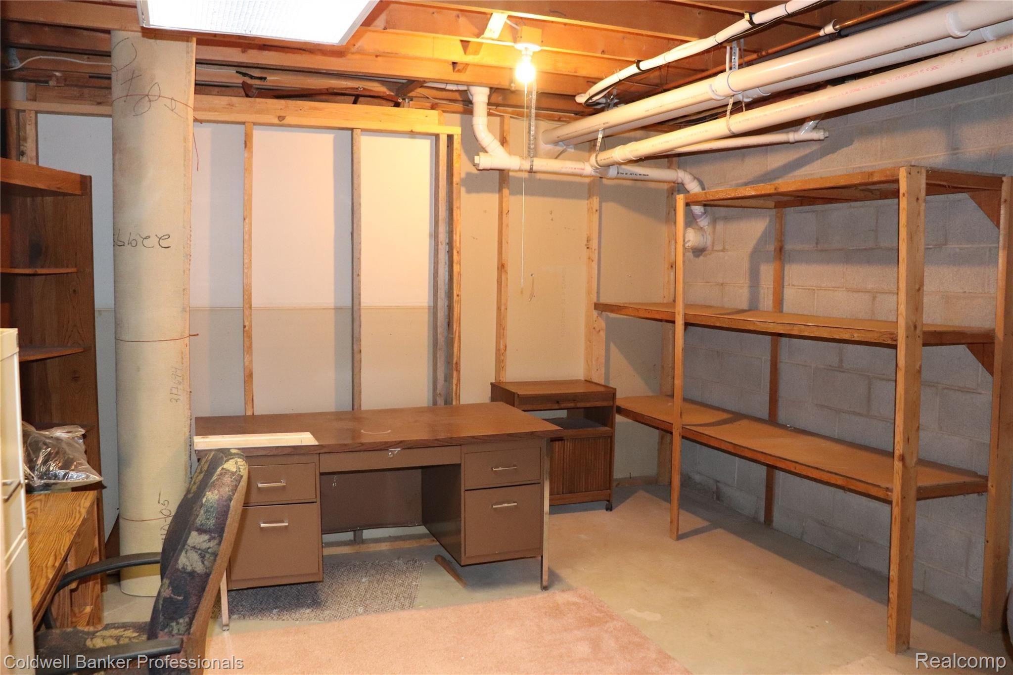 4934 Casey Road Dryden, MI 48428 - Photo 25 of 40 LOTS OF SHELVING IN BASEMENT