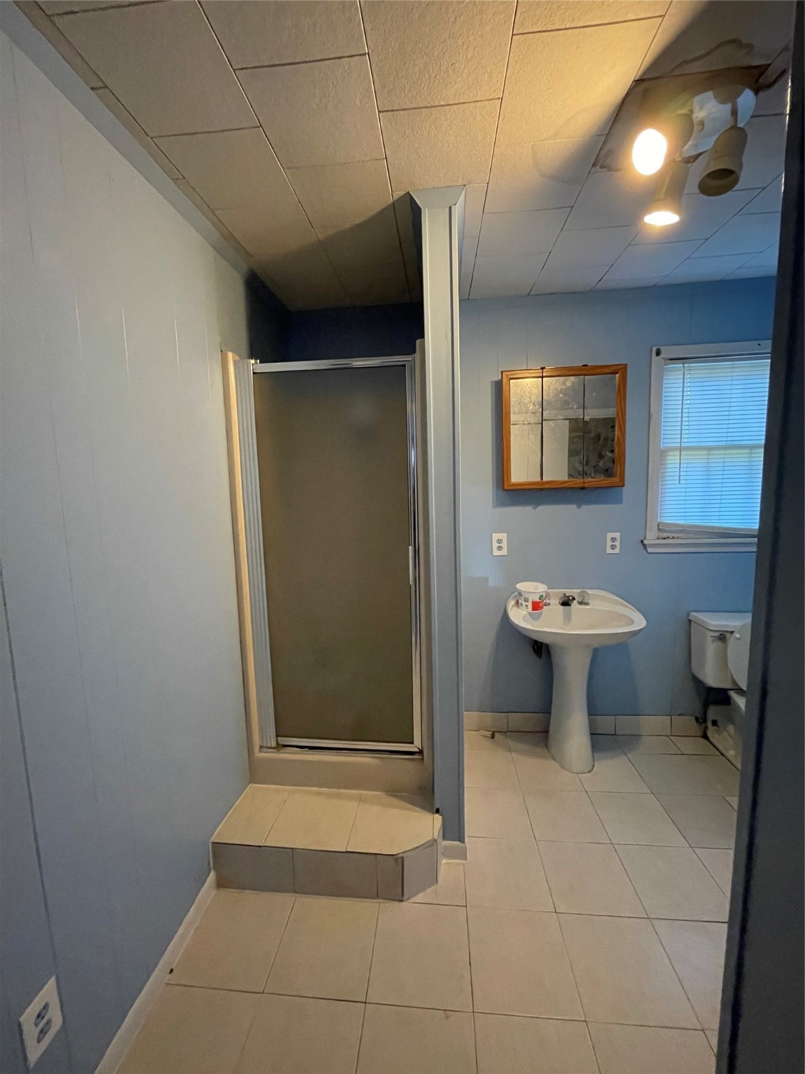 255 Frank Street, Unit AB Kountze, TX 77625 - Photo 33 of 33 a bathroom with a sink toilet and shower