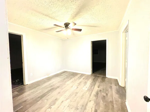 a view of a big room with wooden floor