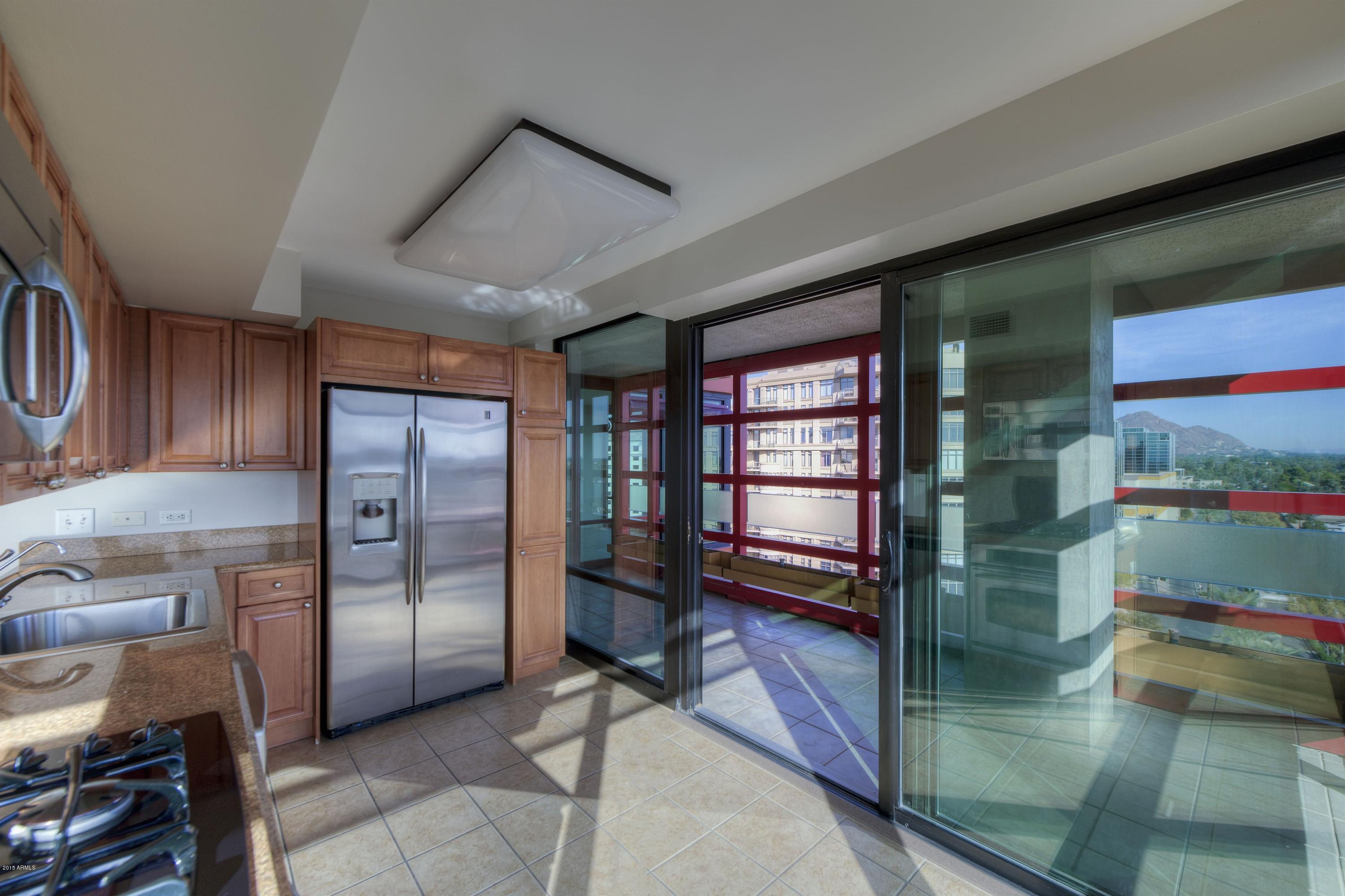 4808 North 24th Street, Unit 1107 Phoenix, AZ 85016 - Photo 4 of 16 006_Kitchen to Balcony