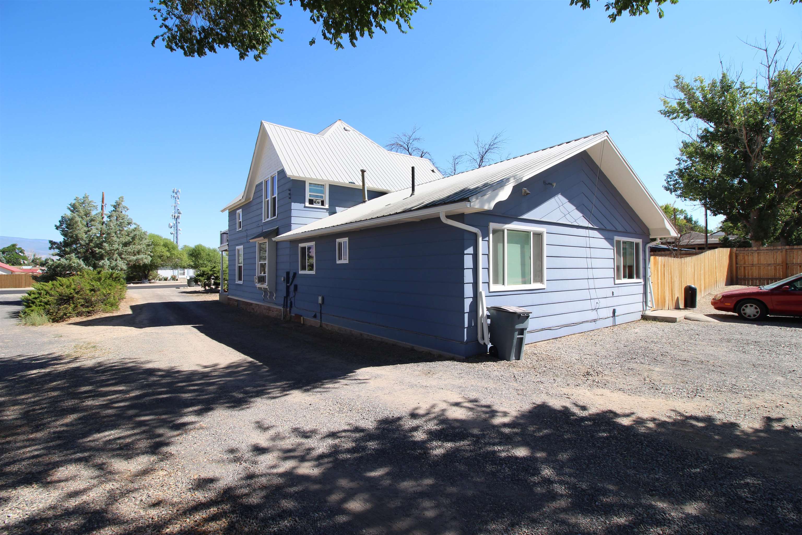 1150 East 7th Street Delta, CO 81416 - Photo 4 of 32 a view of a house with a yard