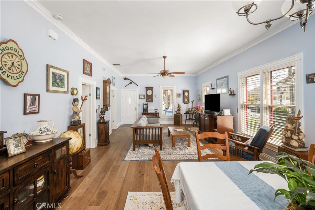 358 North Shaffer Street Orange, CA 92866 - Photo 13 of 45 a living room with furniture a flat screen tv and a large window