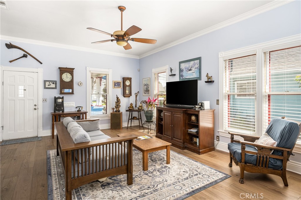358 North Shaffer Street Orange, CA 92866 - Photo 14 of 45 a living room with furniture a window and a flat screen tv