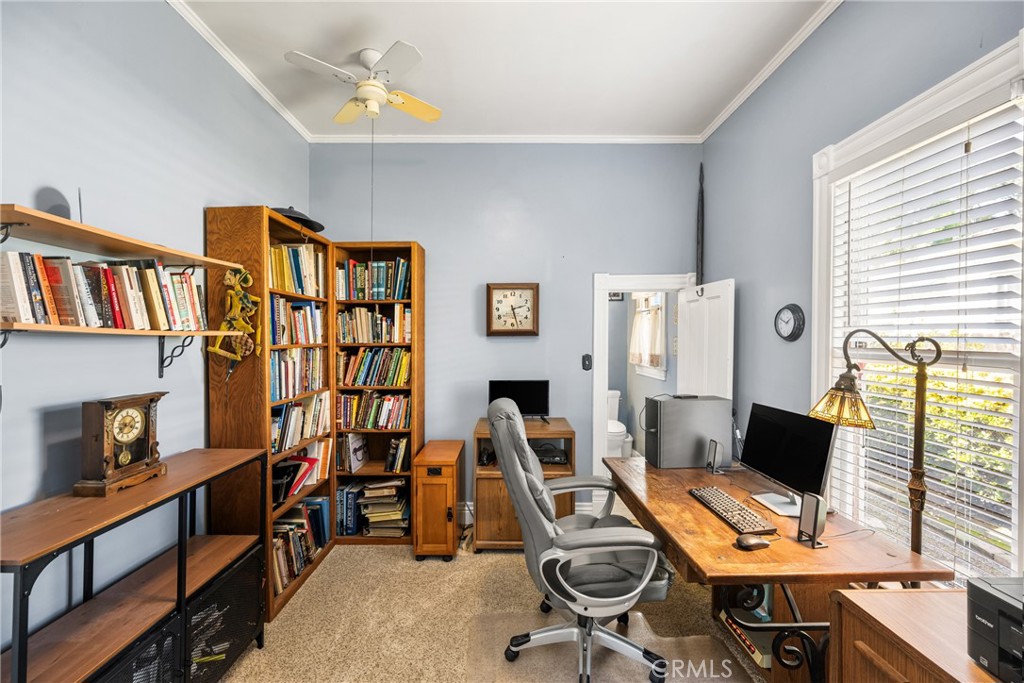 358 North Shaffer Street Orange, CA 92866 - Photo 21 of 45 a view of a workspace with furniture and a window