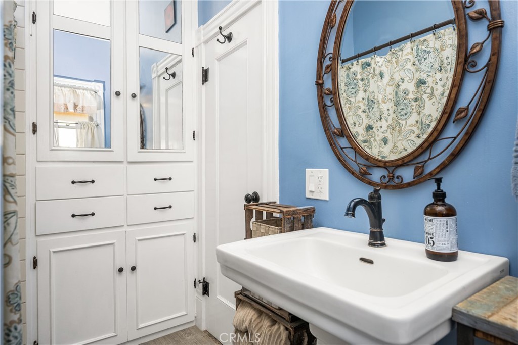 358 North Shaffer Street Orange, CA 92866 - Photo 24 of 45 a bathroom with a sink and a mirror