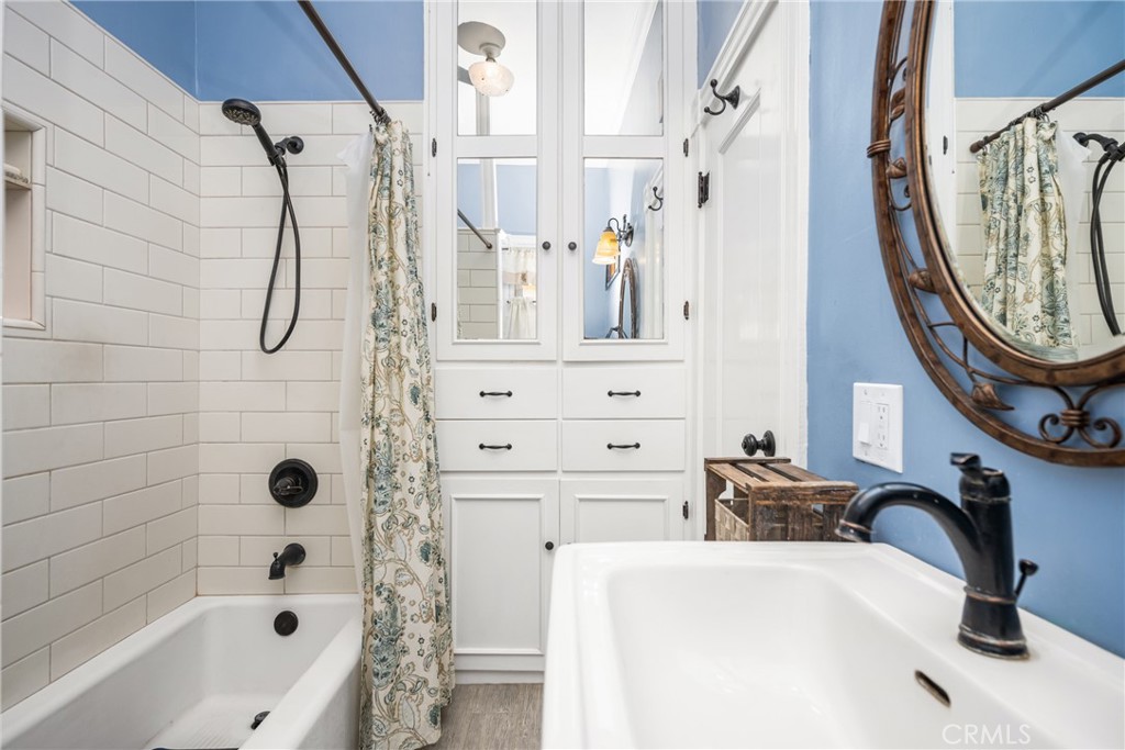 358 North Shaffer Street Orange, CA 92866 - Photo 25 of 45 a bathroom with a sink a vanity and a mirror