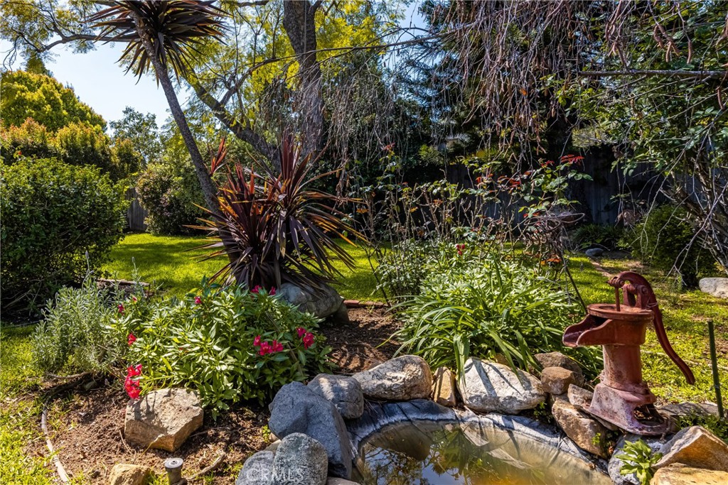 358 North Shaffer Street Orange, CA 92866 - Photo 39 of 45 a backyard of a house with lots of green space and trees