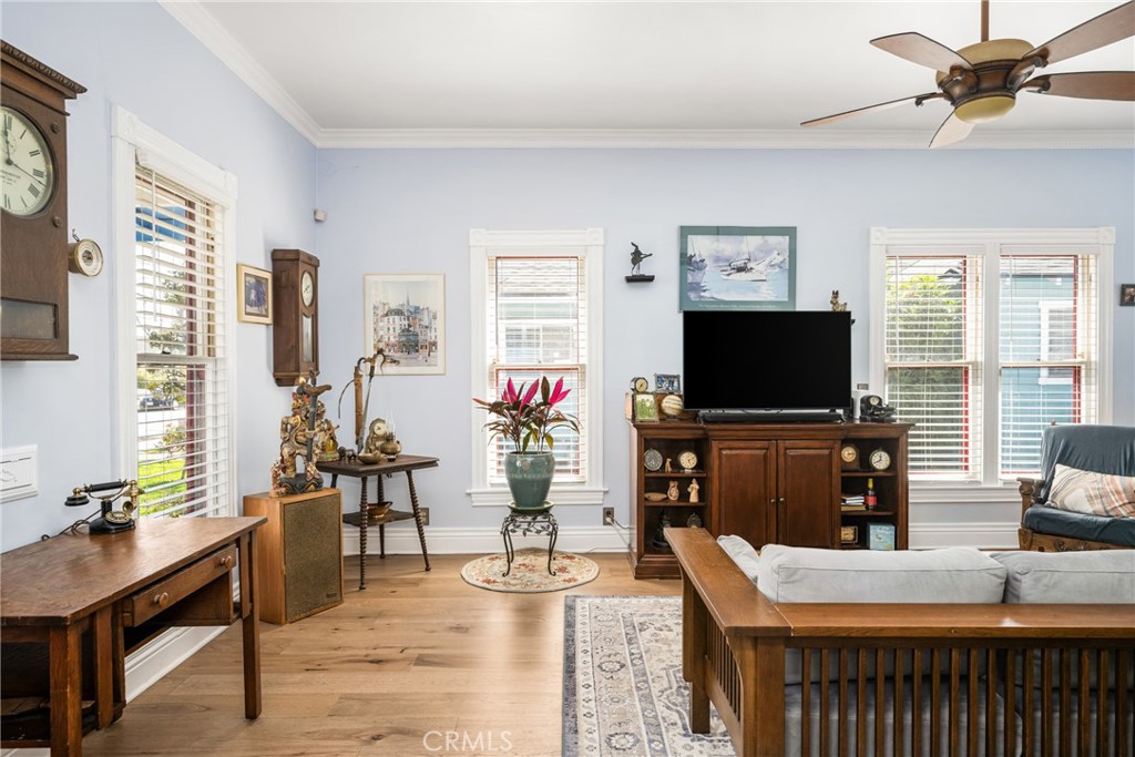 358 North Shaffer Street Orange, CA 92866 - Photo 7 of 45 a living room with furniture and a flat screen tv