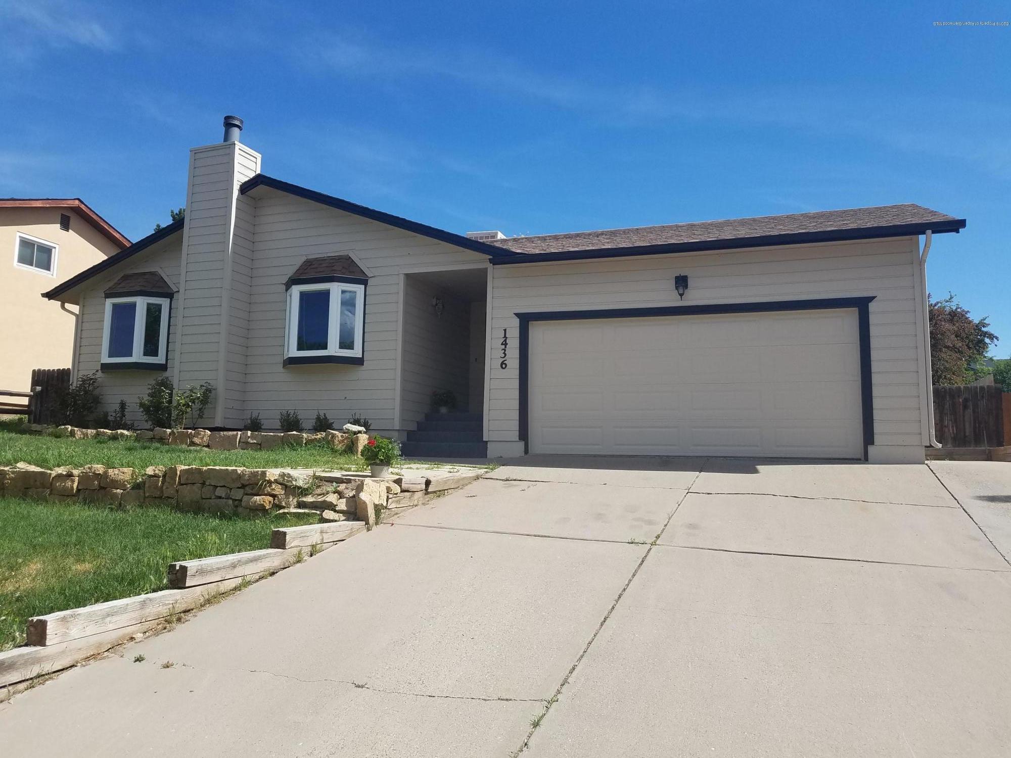 1436 Jays Avenue Rifle, CO 81650 - Photo 1 of 20 a front view of house with yard