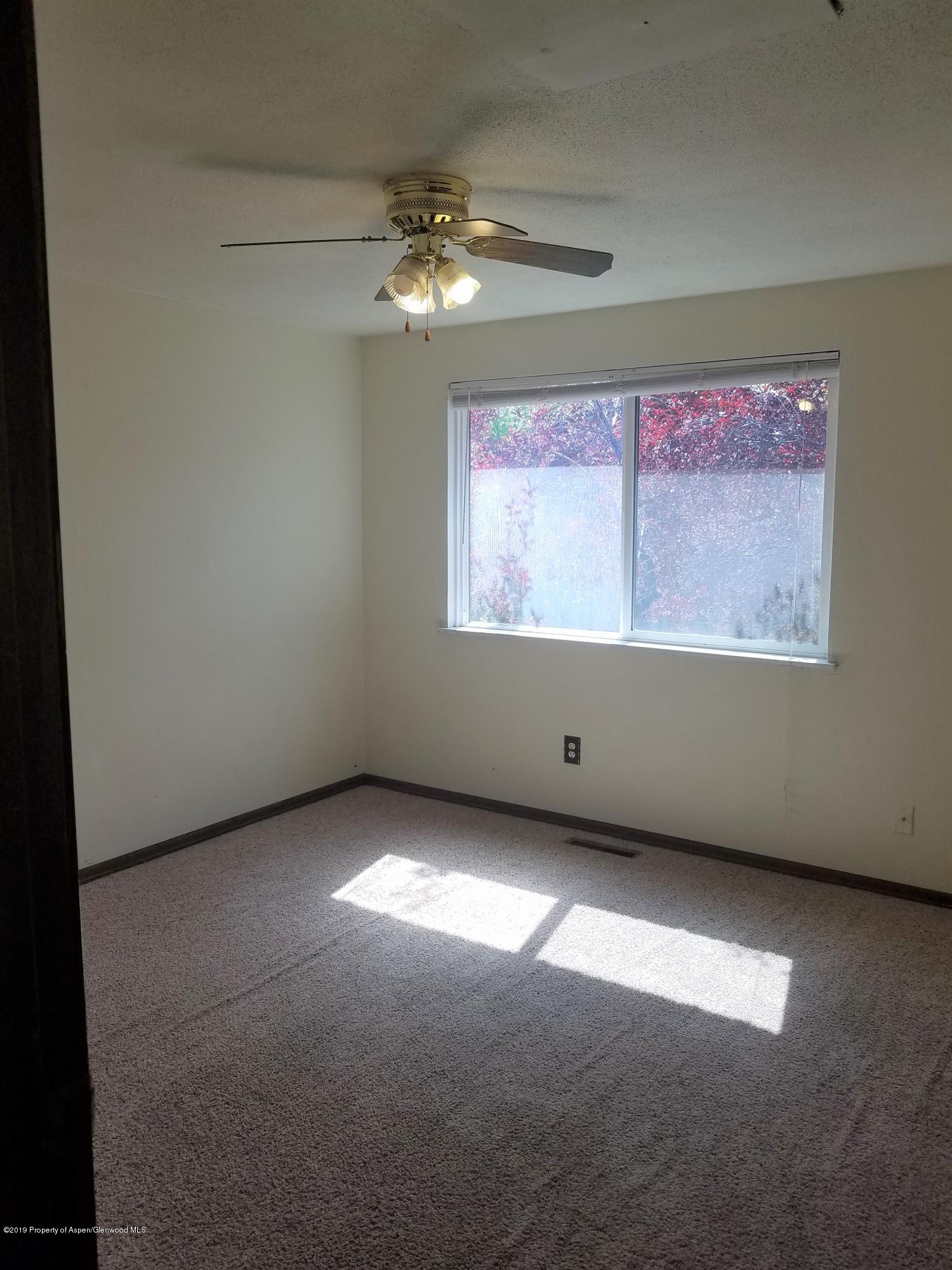 1436 Jays Avenue Rifle, CO 81650 - Photo 16 of 20 an empty room with a window