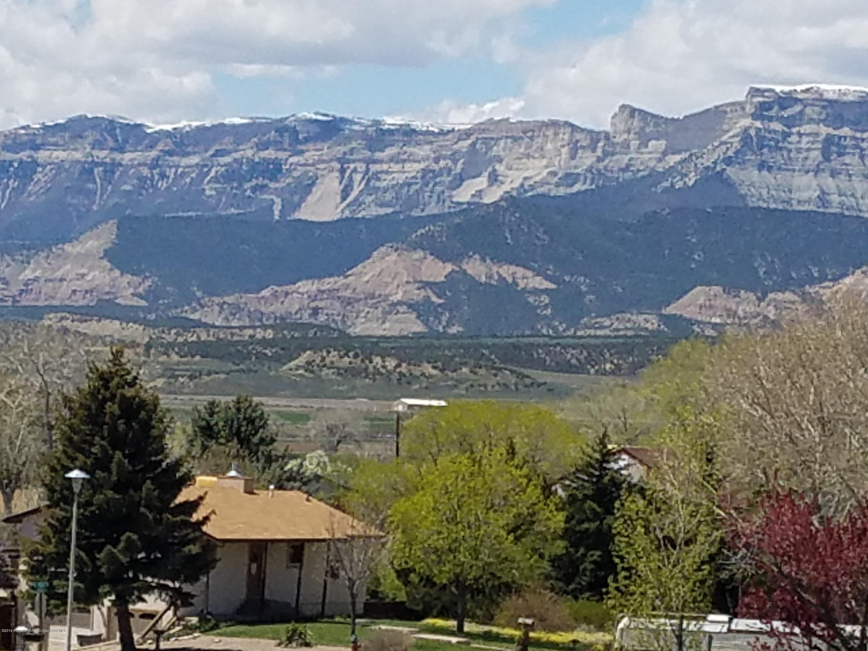 1436 Jays Avenue Rifle, CO 81650 - Photo 20 of 20 a view of a lake with a mountain in the background