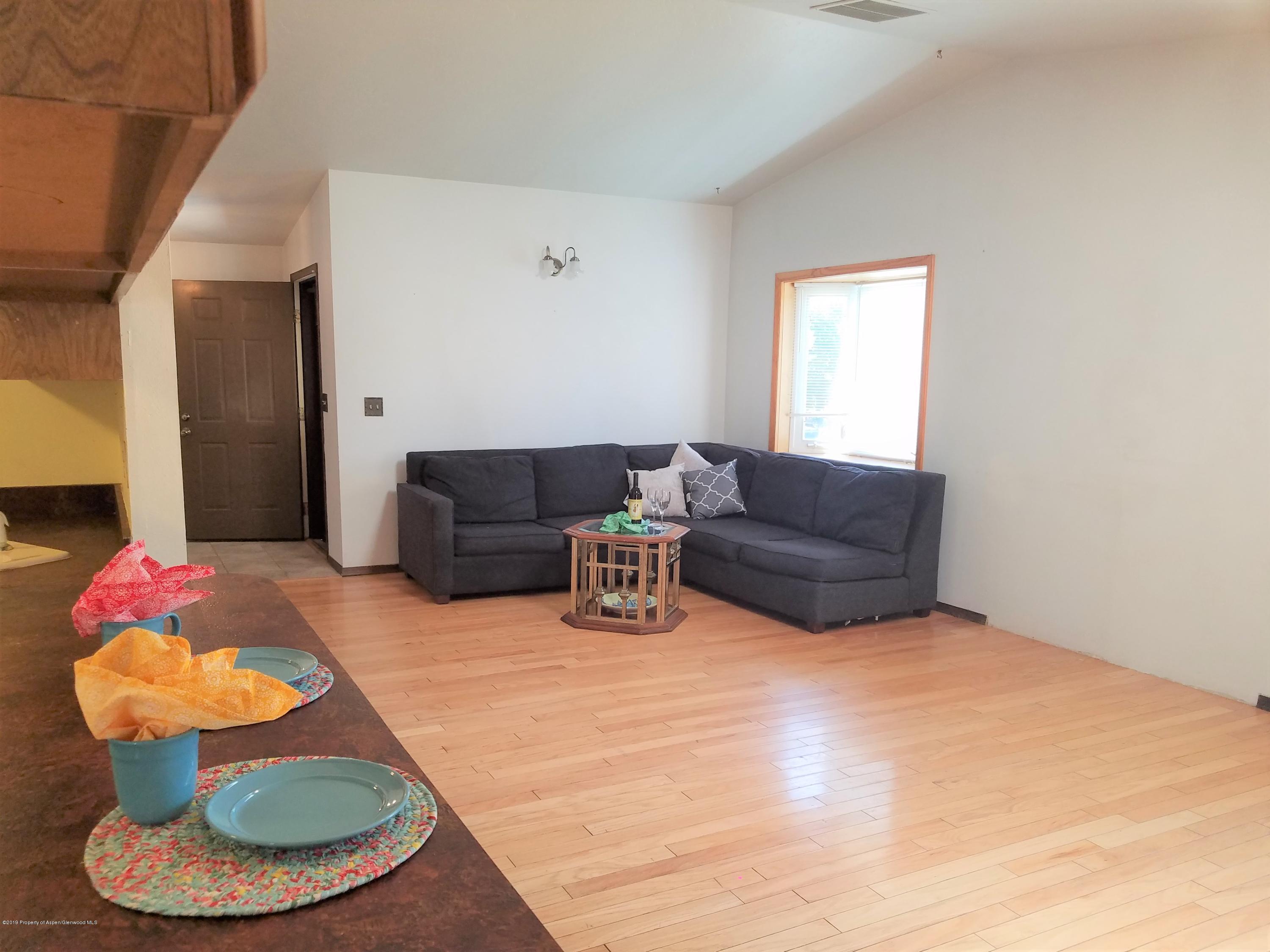 1436 Jays Avenue Rifle, CO 81650 - Photo 8 of 20 a living room with furniture
