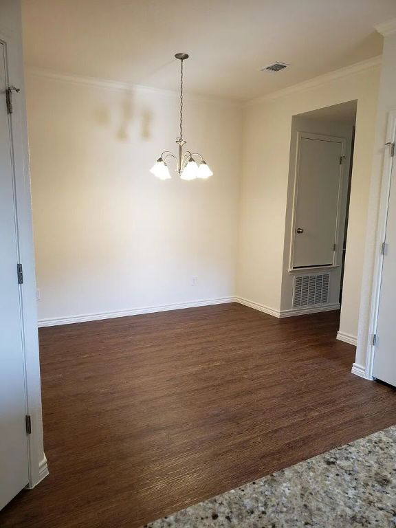 895 Twin Oaks Drive, Unit B Temple, TX 76504 - Photo 7 of 11 a view of empty room with wooden floor