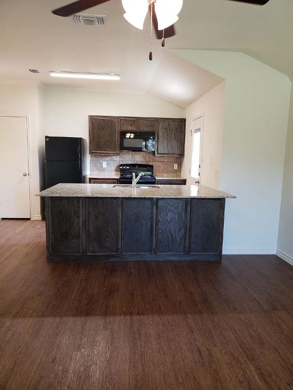 895 Twin Oaks Drive, Unit B Temple, TX 76504 - Photo 9 of 11 a view of kitchen with wooden floor