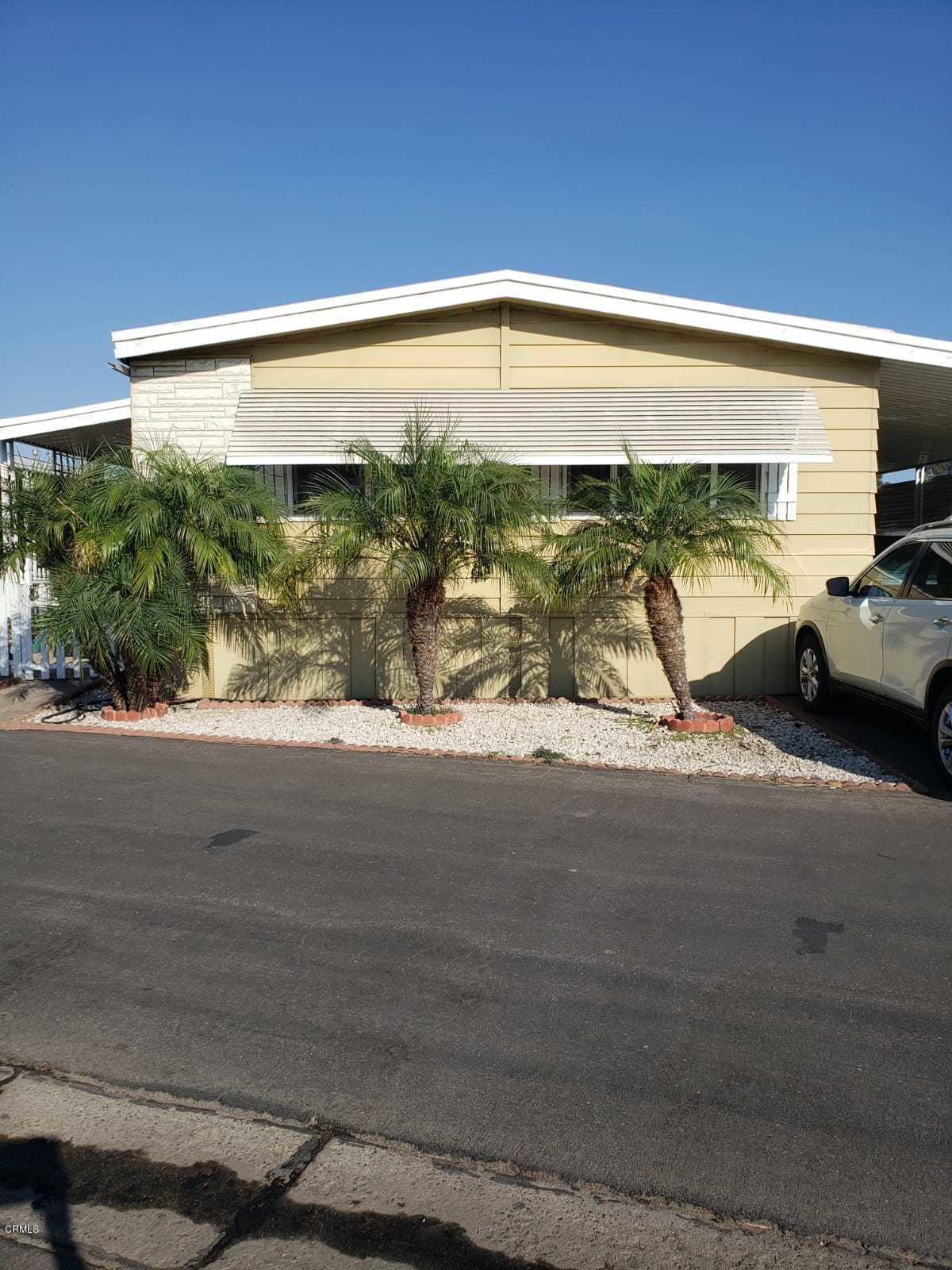 2400 East Pleasant Valley Road, Unit 152 Oxnard, CA 93033 - Photo 3 of 12 a view of a car park from a balcony