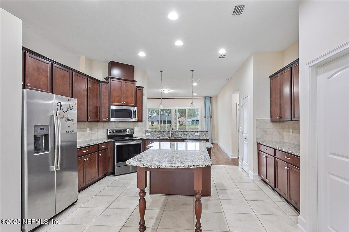 115 Spring Creek Way St. Augustine, FL 32095 - Photo 5 of 24 06-Kitchen