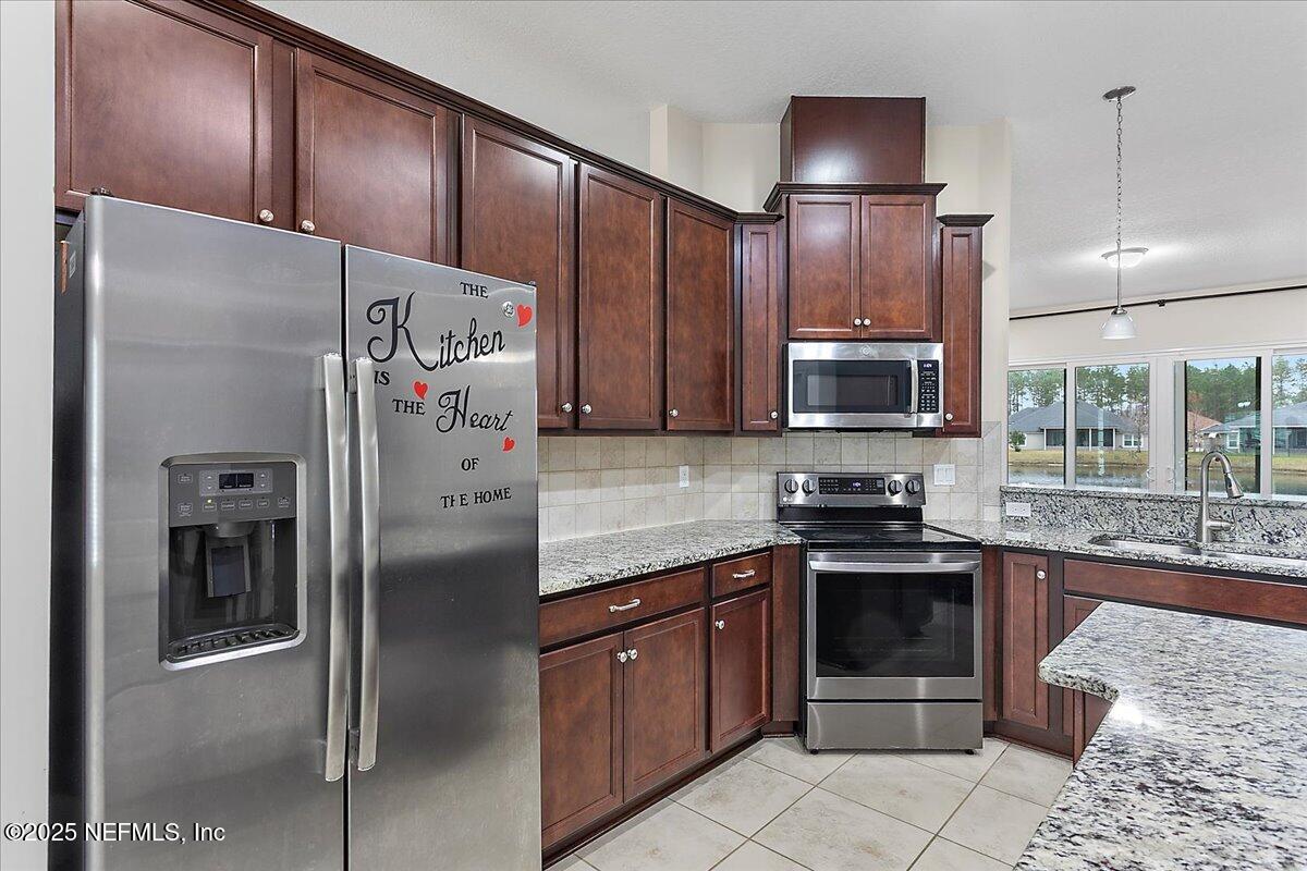 115 Spring Creek Way St. Augustine, FL 32095 - Photo 6 of 24 07-Kitchen