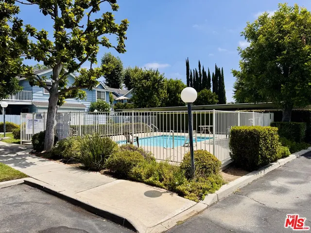 a view of a backyard with a garden
