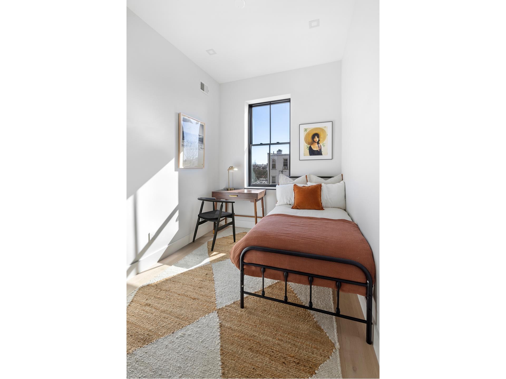 112 Luquer Street, Unit 2 Brooklyn, NY 11231 - Photo 8 of 11 a living room with furniture and a rug