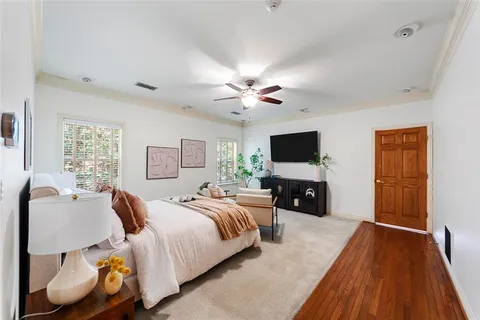 a bed room with a bed and a chandelier