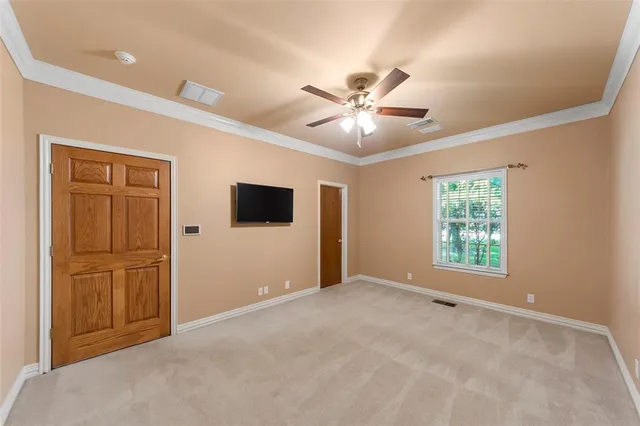 a bathroom with a double vanity sink mirror and toilet