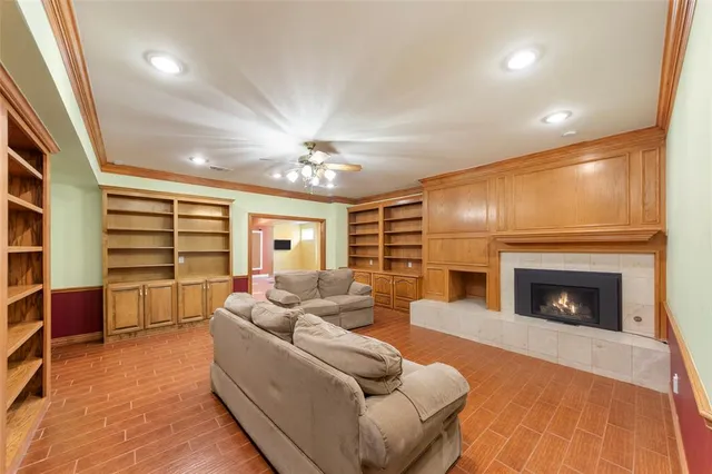 a large kitchen with stainless steel appliances granite countertop a sink and cabinets