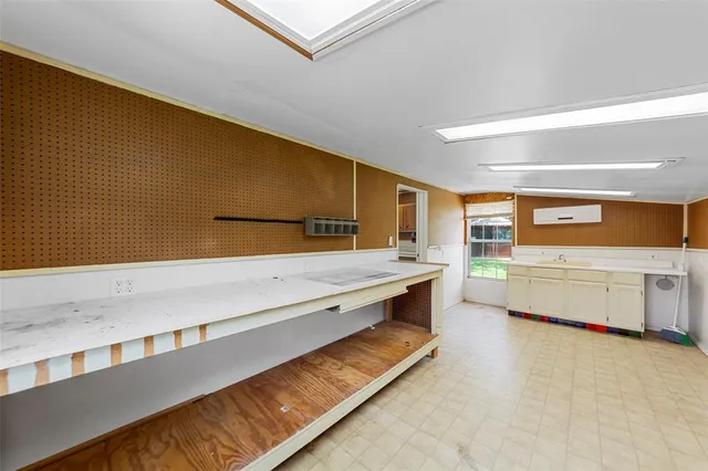 a view of a house with backyard and porch