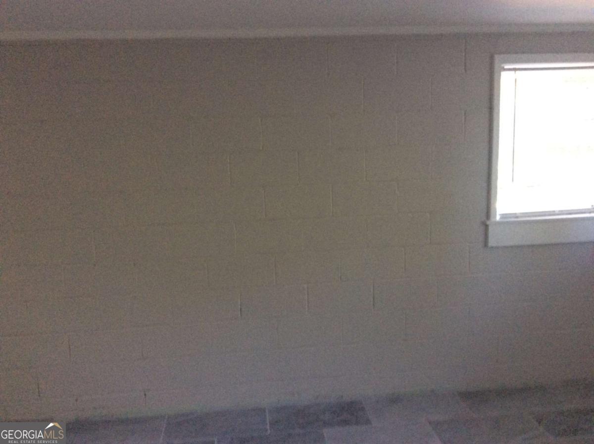 209 Decatur Road McDonough, GA 30253 - Photo 20 of 25 a room that has a window in it