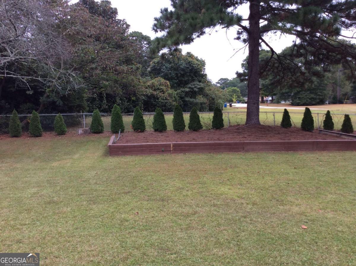 209 Decatur Road McDonough, GA 30253 - Photo 24 of 25 a view of outdoor space and yard