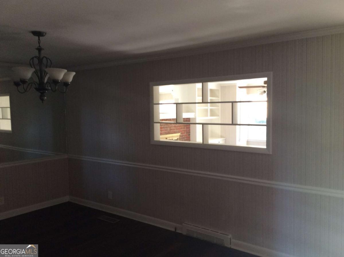 209 Decatur Road McDonough, GA 30253 - Photo 8 of 25 a empty room with a window