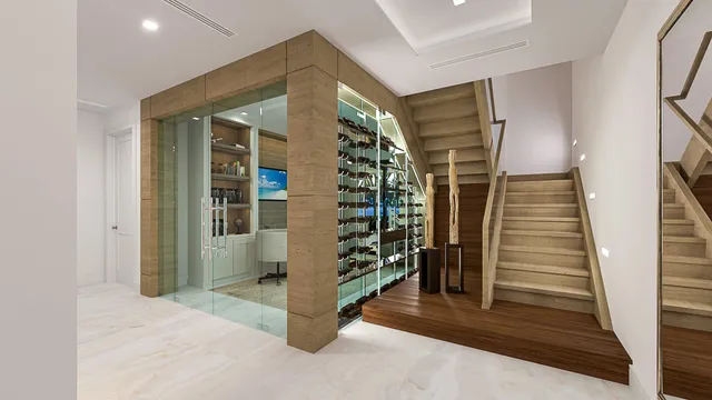 a view of entryway with wooden floor and stairs