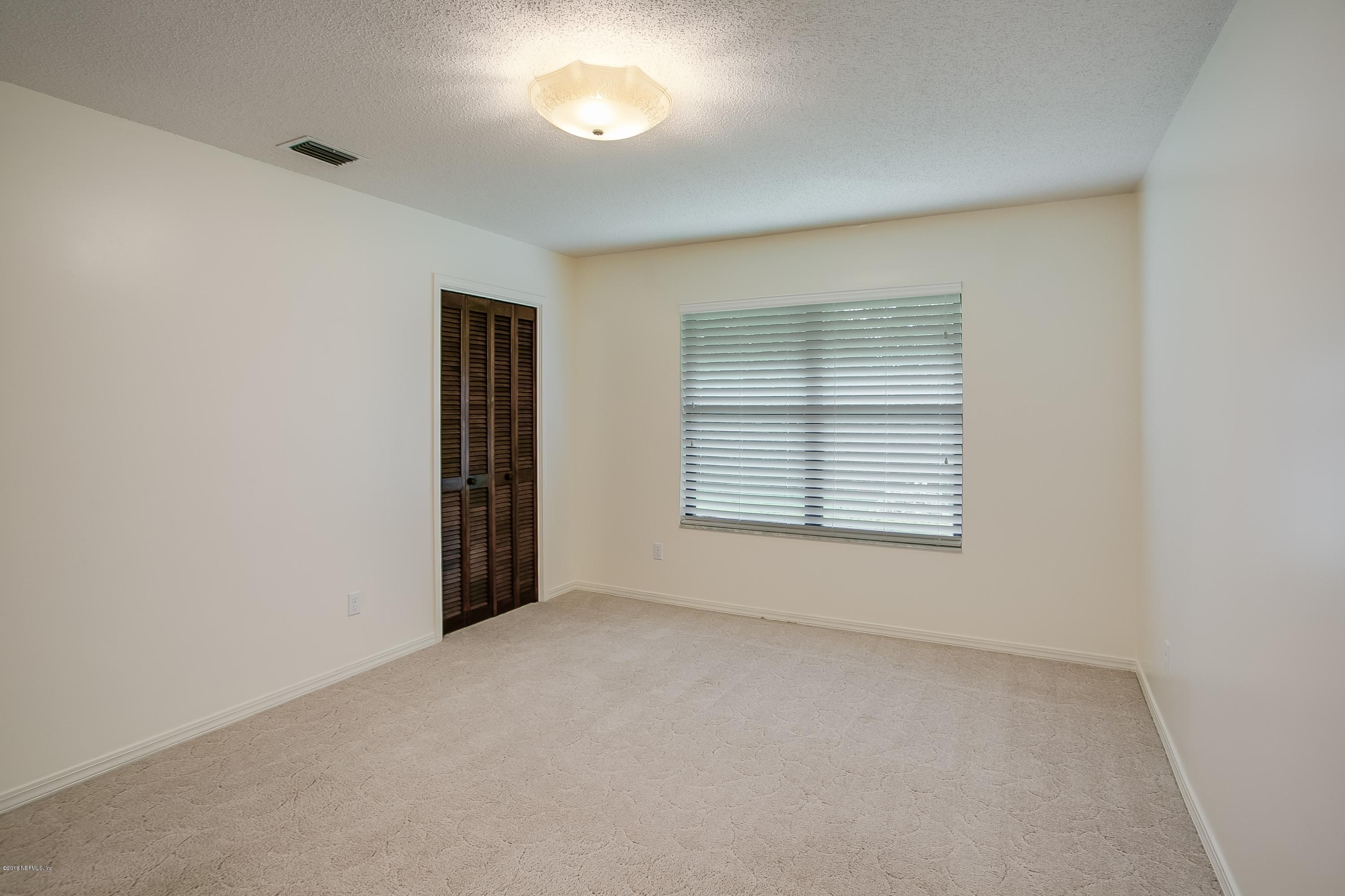 5608 Swamp Fox Road Jacksonville, FL 32210 - Photo 17 of 22 016_Bedroom