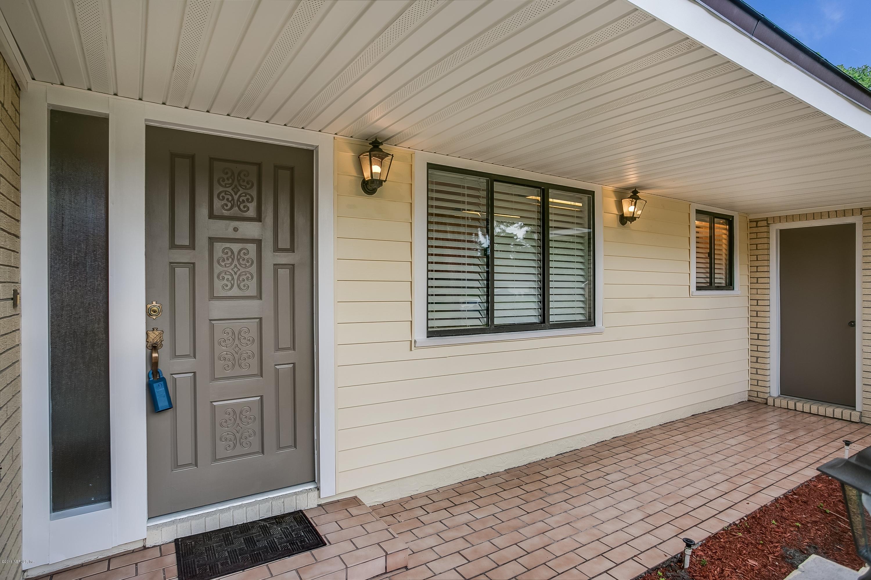 5608 Swamp Fox Road Jacksonville, FL 32210 - Photo 3 of 22 002_Entry