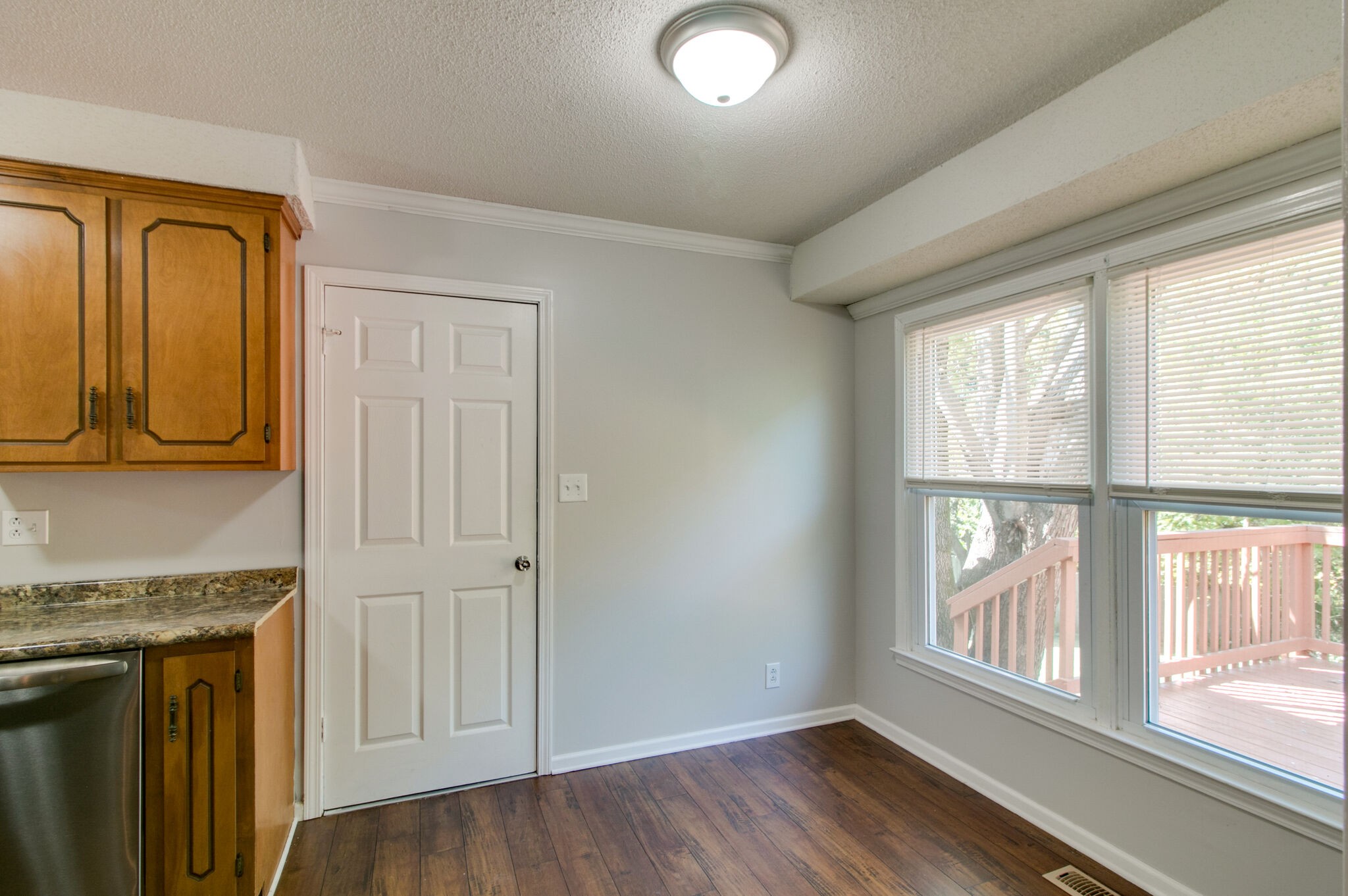 920 Dominion Drive Clarksville, TN 37042 - Photo 11 of 28 wooden floor in an empty room with a window