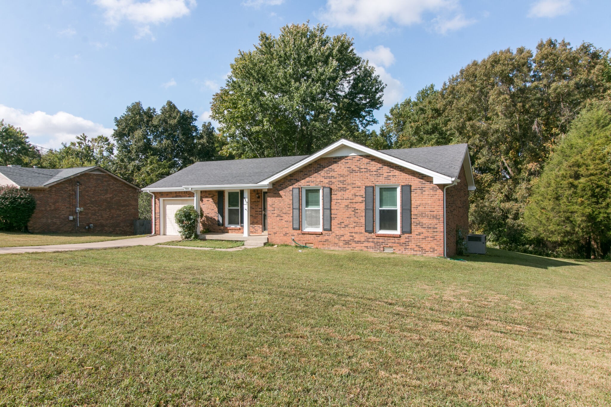 920 Dominion Drive Clarksville, TN 37042 - Photo 2 of 28 a front view of a house with a garden