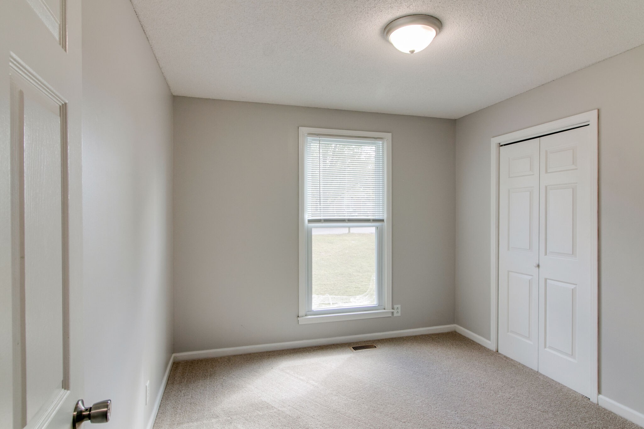 920 Dominion Drive Clarksville, TN 37042 - Photo 22 of 28 an empty room with a window