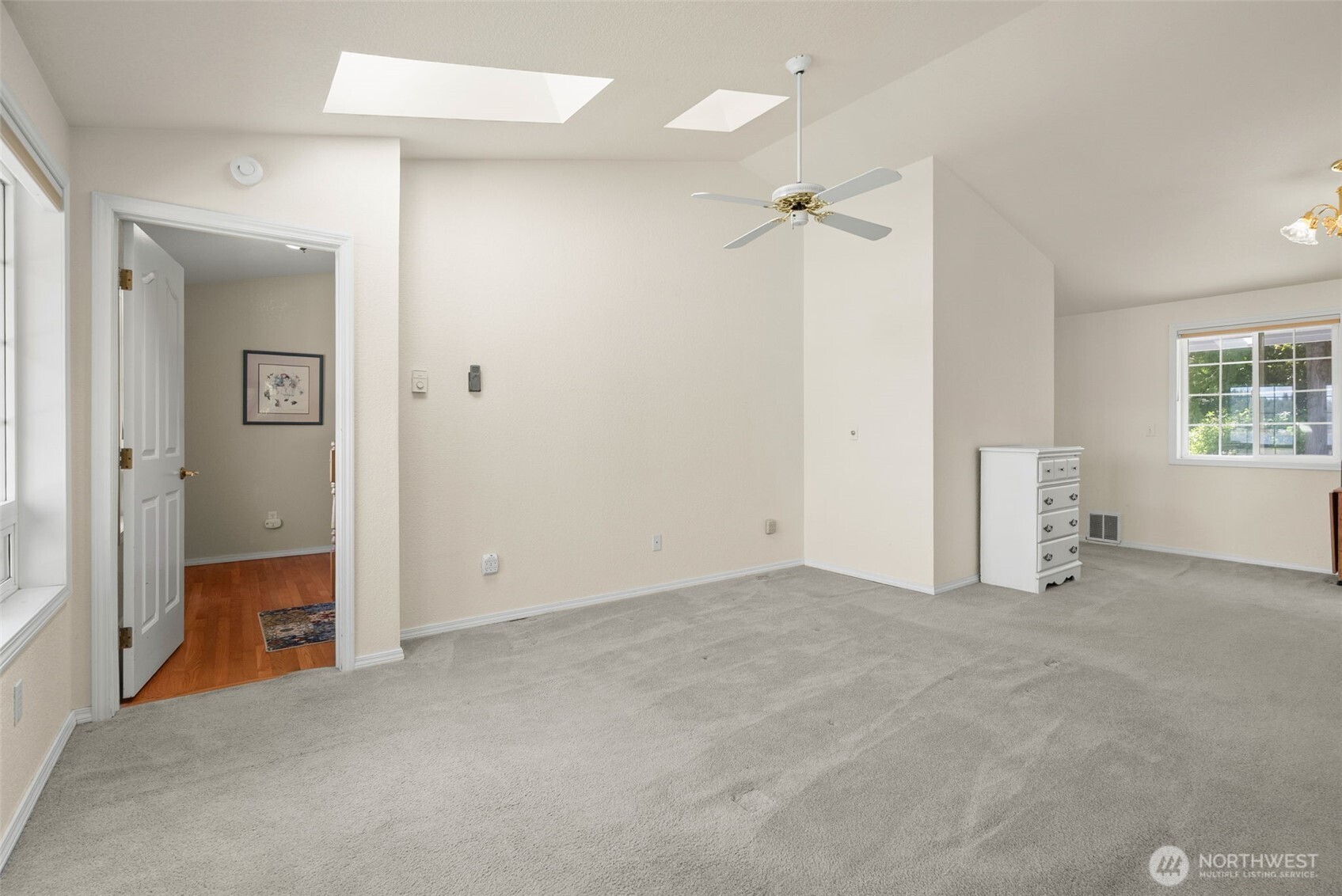 8320 East Grapeview Loop Road Allyn, WA 98524 - Photo 20 of 38 an empty room with windows and closet